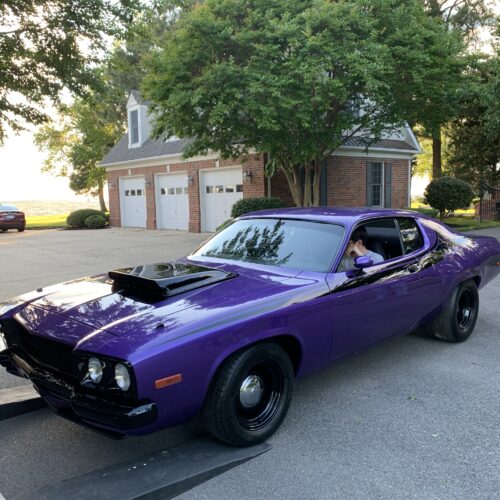 A beautiful muscle car in purple color